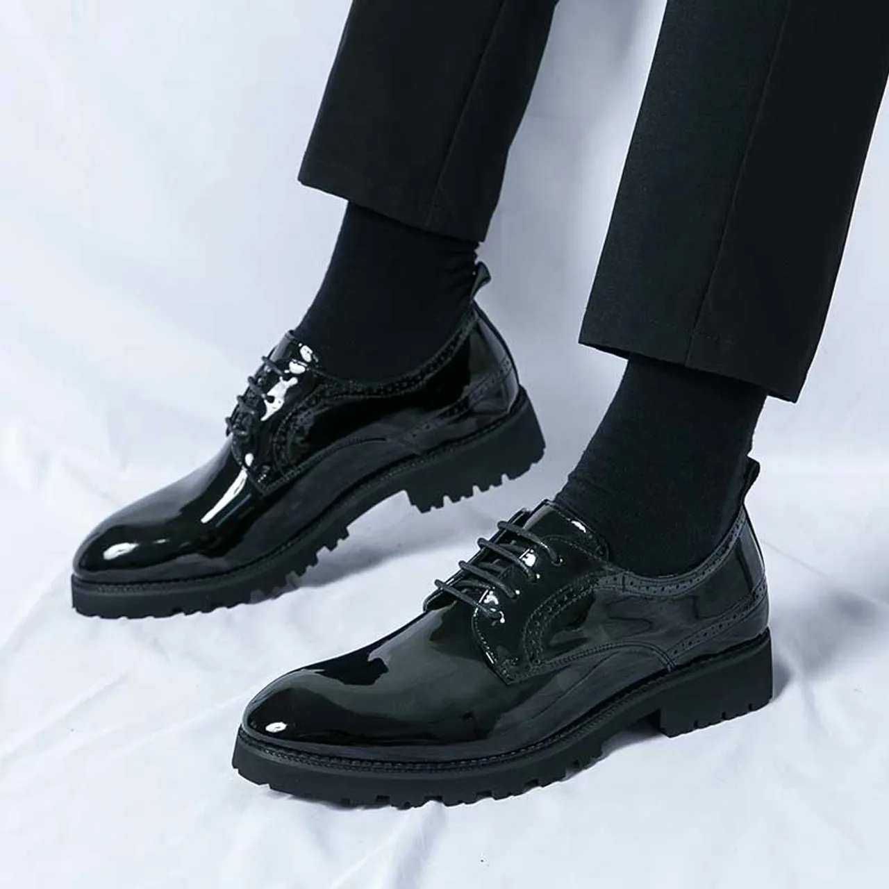 Black patent leather brogue derby dress shoe