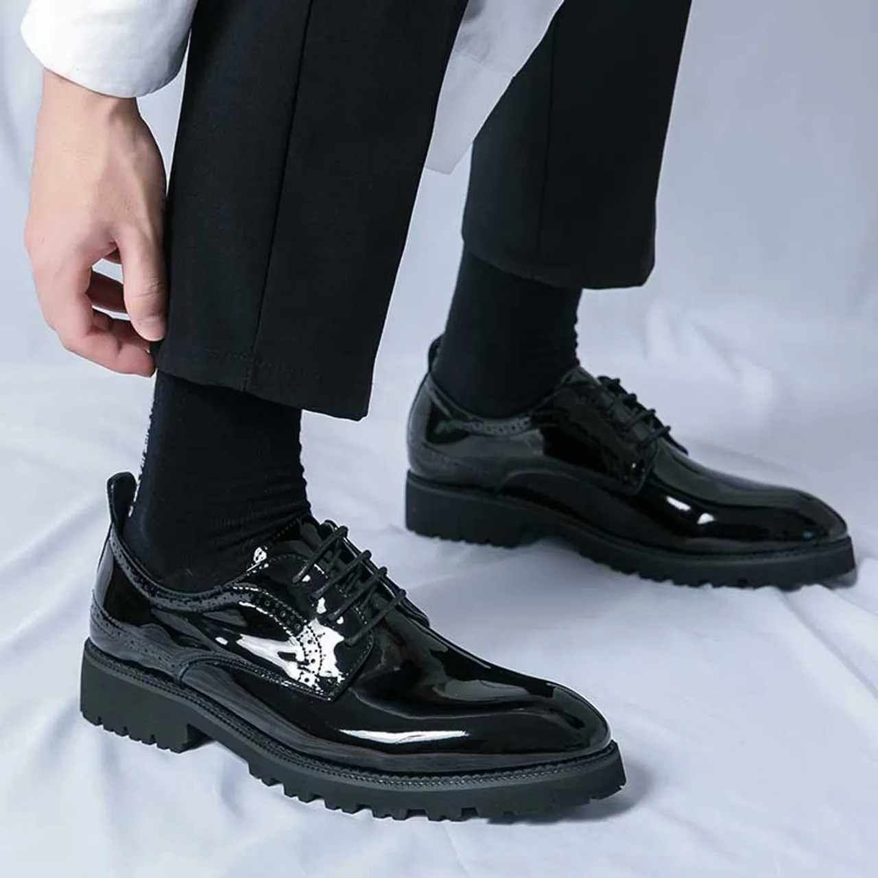 Black patent leather brogue derby dress shoe