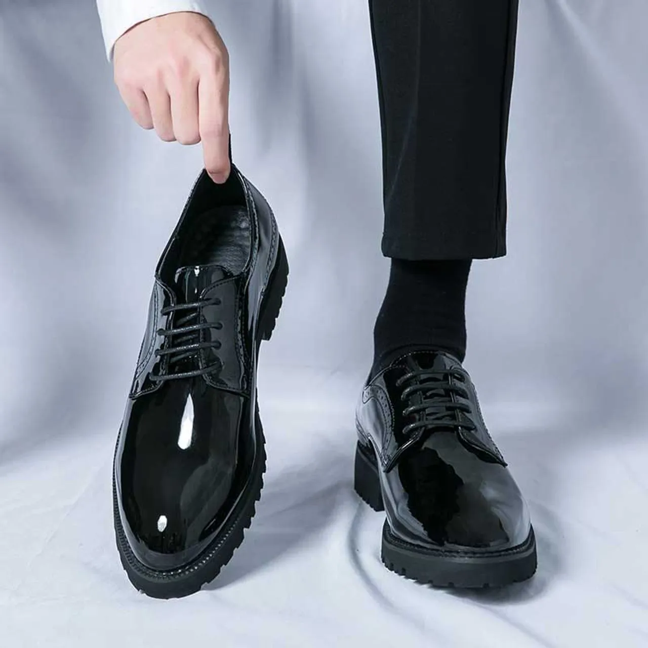 Black patent leather brogue derby dress shoe