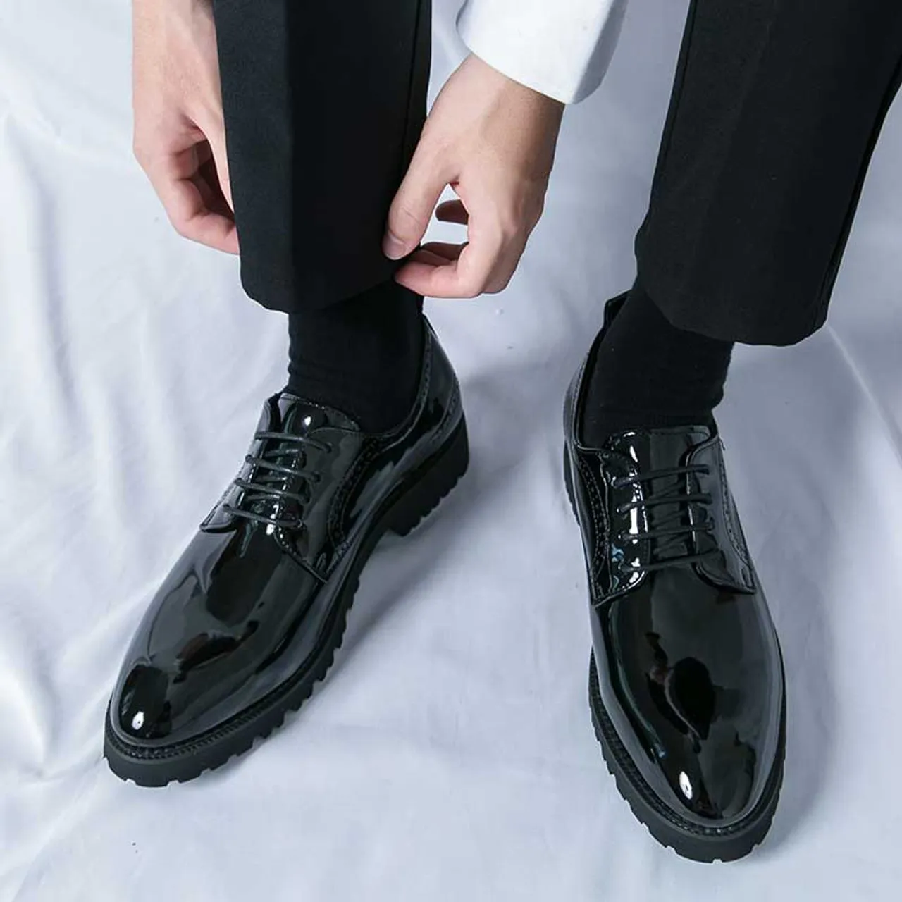 Black patent leather brogue derby dress shoe