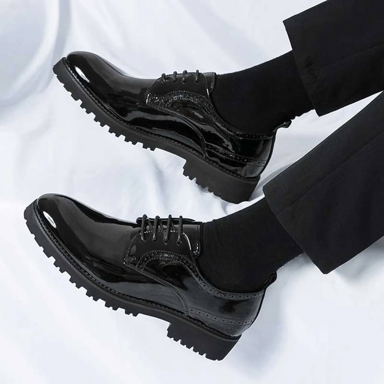 Black patent leather brogue derby dress shoe