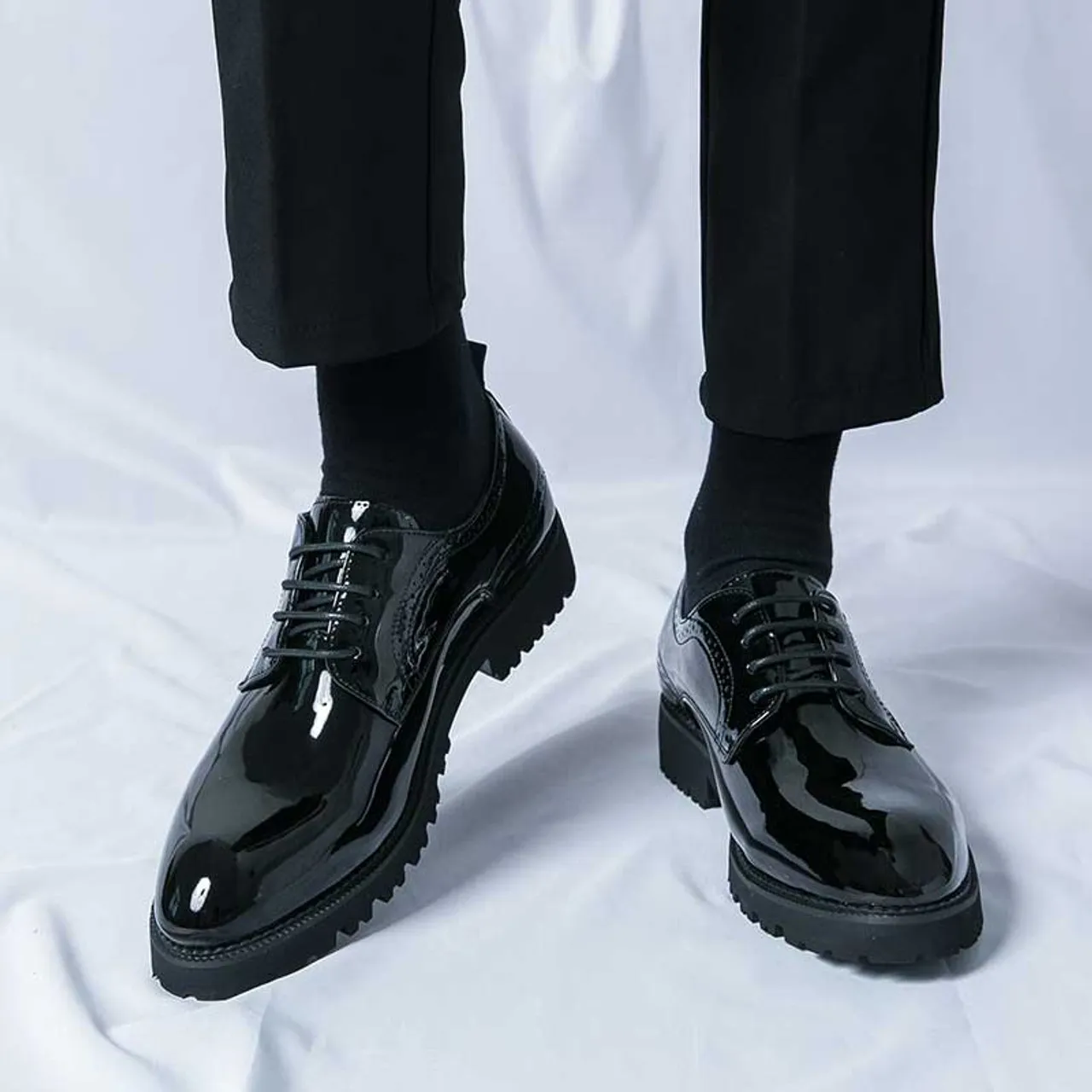 Black patent leather brogue derby dress shoe