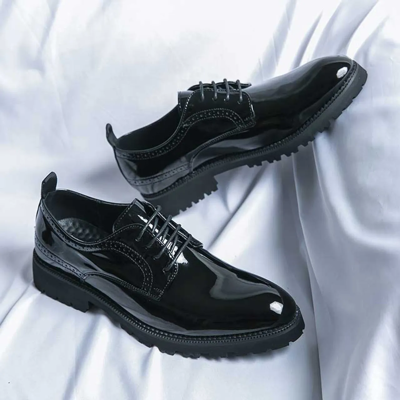 Black patent leather brogue derby dress shoe