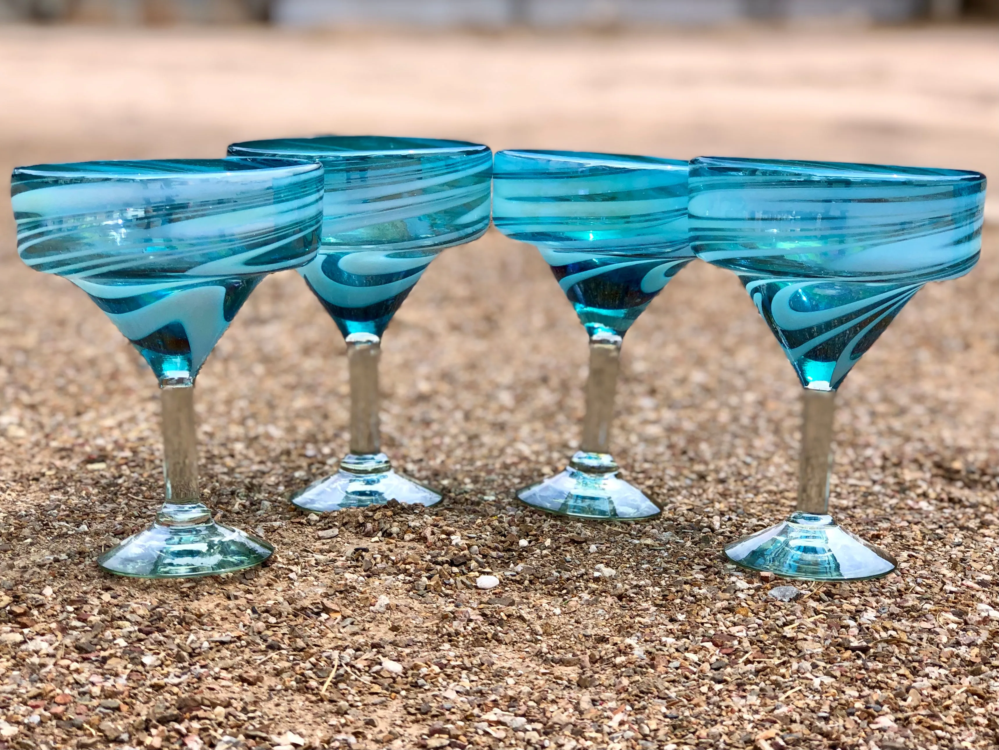 Margarita hand blown glasses in aquamarine with white swirl with clear stem