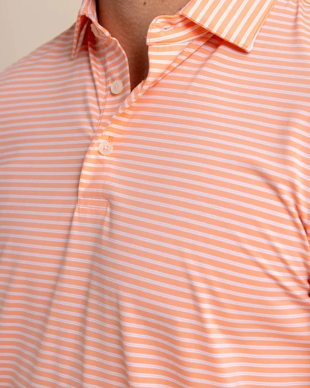 Southern Tide brrr°-eeze Beattie Stripe Performance Polo: Desert Flower Coral