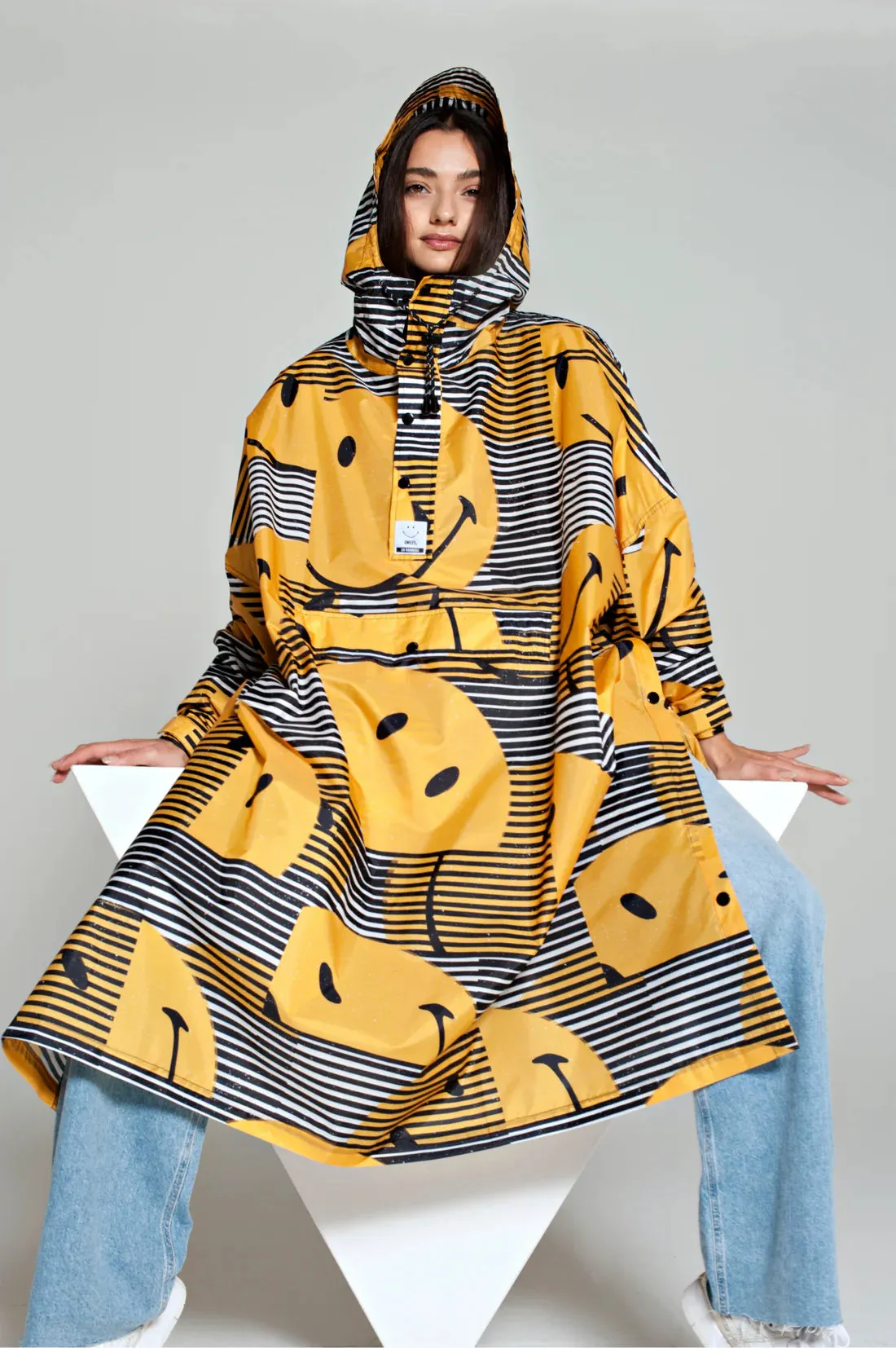 Sunset Smiley | Yellow | Regnponcho fra Rainkiss